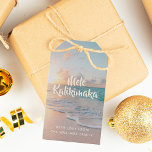 Mele Kalikimaka Custom Tropical Beach Christmas Geschenkanhänger<br><div class="desc">Dieses hübsche Weihnachtsgeschenk-Tag am Meer zeigt ein wunderschönes Küstenseegebiet Foto bei Sonnenaufgang mit einer schönen Typografie,  die Mele Kalikimaka liest. Eine niedlich hawaiianische Art,  fröhliche Weihnachten im Stil mit schönen Inselfotografien zu sagen. Bring mich in diesem Urlaub an den Strand.</div>