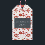Mele Kalikimaka Hawaiian Christmas Red Gift Tag Geschenkanhänger<br><div class="desc">Dieses elegante und moderne Weihnachts- / Urlaubsstipenschild zeigt "mele kalikimaka" und Ihren Text auf marineblau Häuserblock mit roten Urlaubsmustern aus Poinsettias,  Kiefern,  heiligen Blätter und Beeren auf weißem Hintergrund. Personalisieren Sie es für Ihre Bedürfnisse. In meinem Geschäft finden Sie passende Produkte.</div>