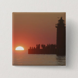 Menschen Leuchtturm Sonnenuntergang Silhouette im  Button