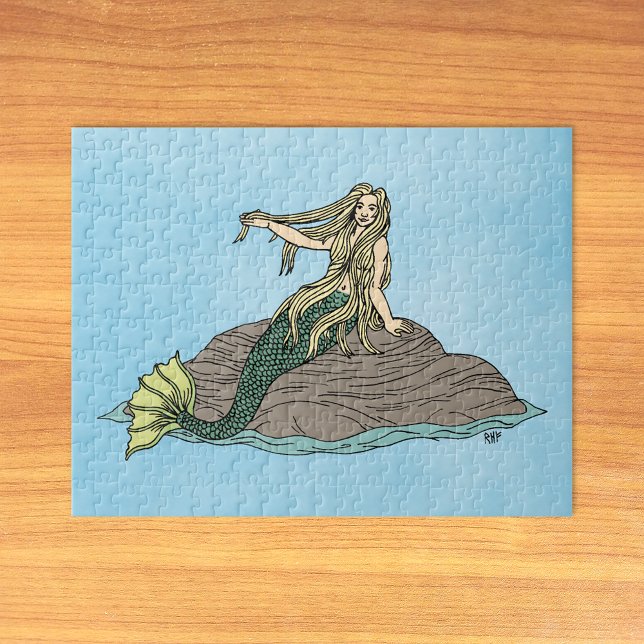 Mermaid auf Steinen Puzzle (Mermaid on Rocks Jigsaw Puzzle on Table)