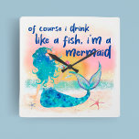 Mermaid Sea | Trinken Sie wie ein Fisch Tropical B Quadratische Wanduhr<br><div class="desc">Fügen Sie ein wenig tropischen Spaß zu Ihrer Zuhause mit diesem lustigen und skurrilen Mermaid Sea Drink wie eine Fisch-Wanduhr. Diese Uhr ist die perfekte Ergänzung zu allen Zimmern, die zum Thema Tiki oder Strand gehören, und bringt Ihnen eine Touch Küstenerlebnis in Ihre Gestaltung. Mit einer Meerjungfrau am Strand und...</div>