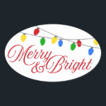 Merry & Bright Christmas Lights Ovaler Aufkleber<br><div class="desc">Fügen Sie Ihrer Urlaubskorrespondenz,  Ihren Grußkarten oder Geschenken eine kleine Touch etwas Extra hinzu. Diese modernen ovalen Aufkleber zeigen die Saiten heller Weihnachtslichter in Rot,  Grün,  Gelb und Blau,  die sich über die obere Kante ziehen. Im Folgenden finden Sie die Wörter 'Merry & Bright' in der Weihnachtsschrift.</div>