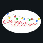 Merry & Bright Christmas Lights Ovaler Aufkleber<br><div class="desc">Fügen Sie Ihrer Urlaubskorrespondenz,  Ihren Grußkarten oder Geschenken eine kleine Touch etwas Extra hinzu. Diese modernen ovalen Aufkleber zeigen die Saiten heller Weihnachtslichter in Rot,  Grün,  Gelb und Blau,  die sich über die obere Kante ziehen. Im Folgenden finden Sie die Wörter 'Merry & Bright' in der Weihnachtsschrift.</div>