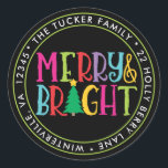Merry & Bright Colorful Christmas Address Label Runder Aufkleber<br><div class="desc">This unique Christmas design features the expression "Merry & Bright" in colorful letters accented with a Christmas tree on a black background! This design is based on our "Merry & Bright" photo Christmas card. Perfect for party favors for your child's classroom Christmas party or for a holiday party or cookie...</div>