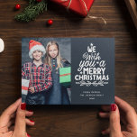 Merry Christmas 3 photos grey family Holiday Card Feiertagskarte<br><div class="desc">Modern holiday greeting card, customizable with one of your favorite family Christmas portraits on the front, beside a lovely white lettering caption that reads "we wish you a merry Christmas" over a plain dark grey background. On the reverse of the card, you can upload two more photos and your personal...</div>