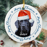 Merry Christmas Black Labrador Cute Santa Dog Keramik Ornament<br><div class="desc">Decorate your tree and spoil your favorite labrador this holiday season with this with this Merry Christmas Santa Dog Black Labrador Christmas ornament and matching decor . A wonderful gift to all Labrador Lovers. This black lab christmas ornament will be hat Among Labrador Lovers bevorzugt. Visit our collection for matching...</div>