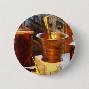 Messingmörser und Stampfe Button