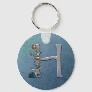 MetallBlumen-Monogramm H Schlüsselanhänger