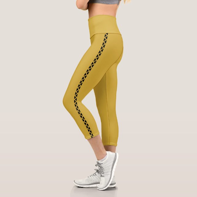 Metallisch goldene Capri-Leggings mit schwarzem Se Capri Leggings (Links)