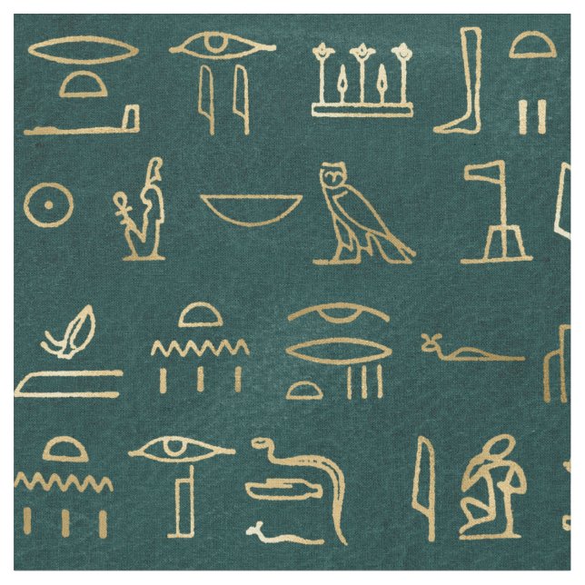 Metallische ägyptische Hieroglyphen auf Waldgrün Stoff (Nahaufnahme)