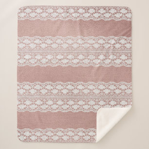 Metallische Rose Gold, cremefarbene Spitzentextur. Sherpadecke