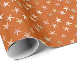 Metallische Sterne, blasses Gold und Geschenkpapier