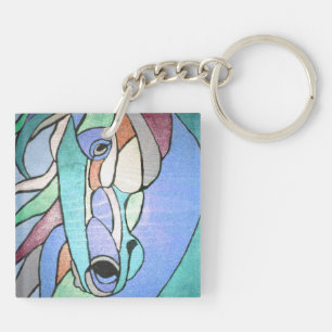 Metallisches Pferd im blauen Schlüsselanhänger