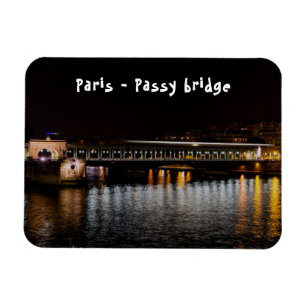 Metro crossing Bir-Hakeim bridge at night Magnet