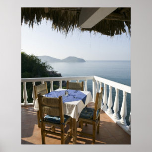 Mexiko, Guerrero, Zihuatanejo. Café Table over Poster