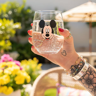 Micky is likely "Mickey" and in German, it is tran Weinglas Ohne Stiel