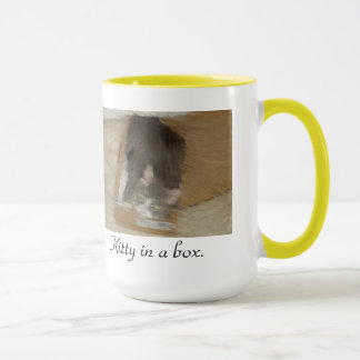 Miezekatze in einem Kasten Tasse