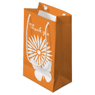 Milchprodukte und Schmetterlinge in der Orangen Ge Kleine Geschenktüte