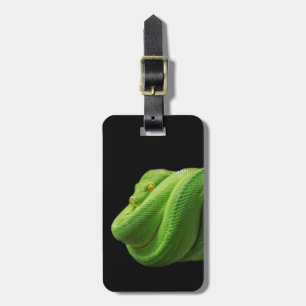 Mimimalist schwarze Pythonschlange auf Schwarzem Gepäckanhänger