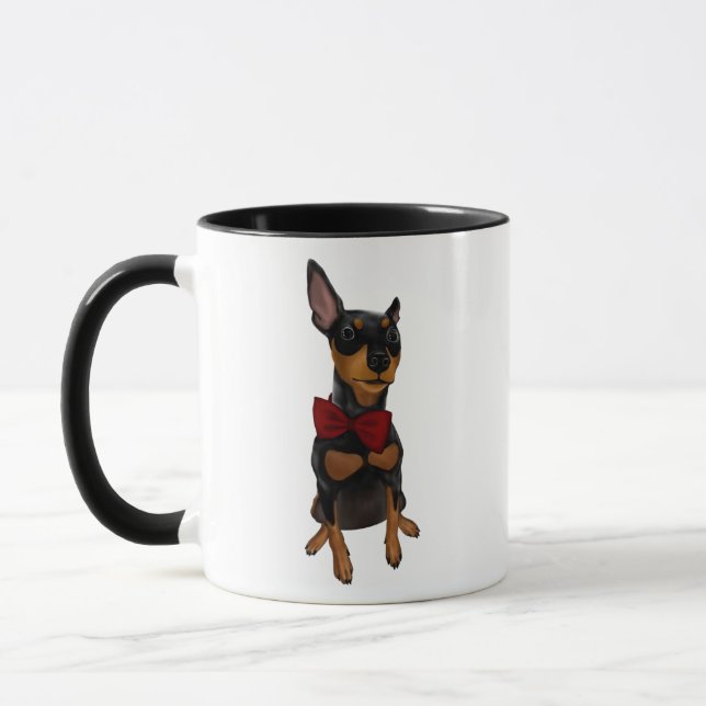 MiniaturPinscher (minimales Button) mit der Tasse (Links)