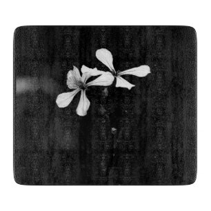 minimale schwarze und weiße Blumenelemente Schneidebrett