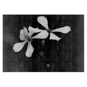 minimale schwarze und weiße Blumenelemente Schneidebrett