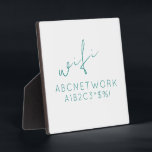 Minimale WiFi-Kennwortsignierung Fotoplatte<br><div class="desc">Behalt deine Gäste mit dieser stilvollen Minimal WiFi Password Sign Plaque verbunden. Diese Plakette besticht durch ein schlichtes und dennoch modernes Design mit einem eleganten, türkisfarbenen Schriftart auf schlichtem, weißem Hintergrund. Es ist ideal, um Ihr WiFi-Passwort so anzuzeigen, dass es sowohl funktionell als auch dekorativ ist. Die Größe 5, 25x5,...</div>