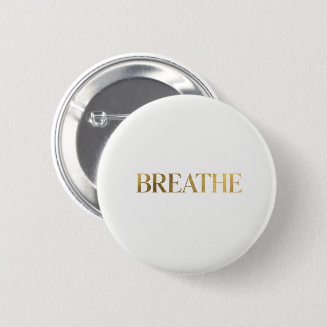 Minimalist typography with gold word breathe button (Vorne & Hinten)