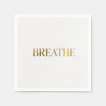 Minimalist typography with gold word breathe