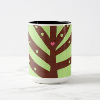 Minimalistischer Baum mit rosa Herz und Blättern Zweifarbige Tasse