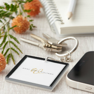 Minimalistisches Schwarz-Gold-Schrift-Zweirahmen-M Schlüsselanhänger