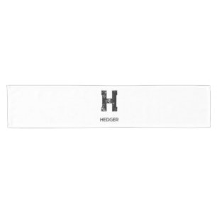 MINIMALISTISCHES SCHWARZES EIN-BUCHSTABEN-MONOGRAM KURZER TISCHLÄUFER