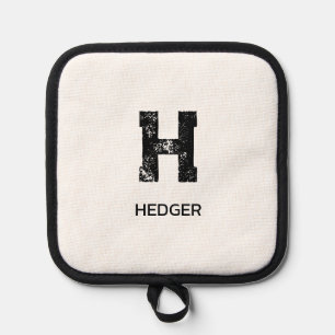 MINIMALISTISCHES SCHWARZES EIN-BUCHSTABEN-MONOGRAM TOPFLAPPEN