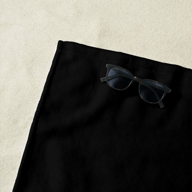 Minimalistisches schwarzes schlichtes strandtuch (Beispiel)