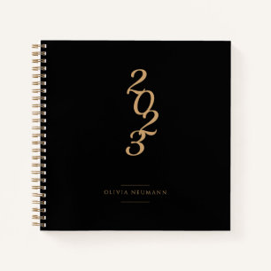 Minimalistisches schwarzes und goldenes Notizbuch