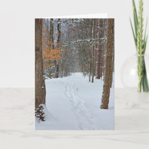 Mitgefühl Schneeige Fußspuren in einem Winterwald Karte