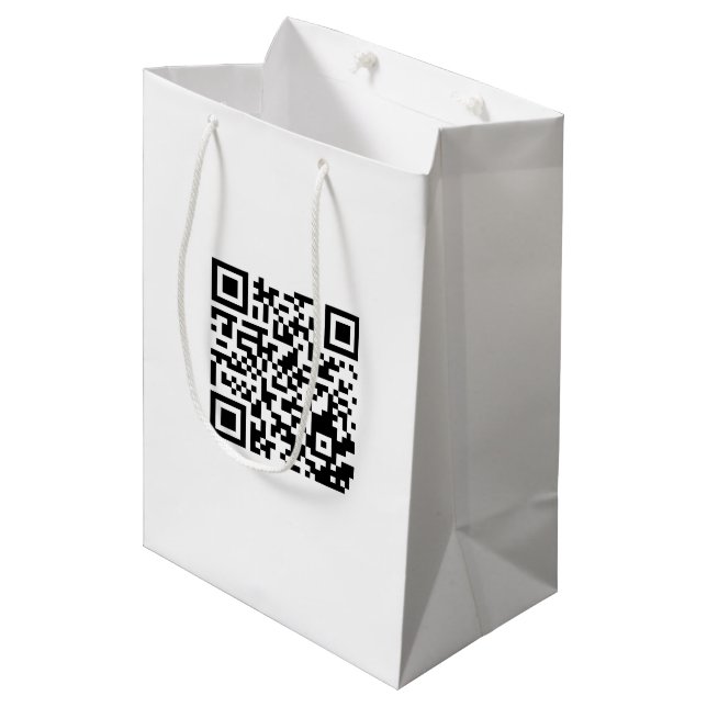Mittlere Bag mit QR-Code für die Werbeaktion von M Mittlere Geschenktüte (Vorderseite Schrägansicht)