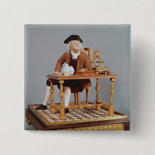 Modell von Benjamin Franklin an seinem Tisch Button