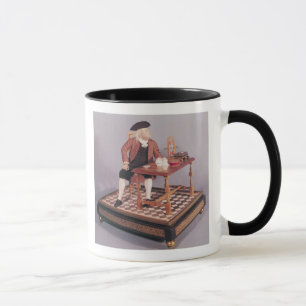 Modell von Benjamin Franklin an seinem Tisch Tasse