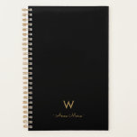 Modern Black Gold Script Monogram Planer<br><div class="desc">Ein modernes, elegantes Monogramm-Design mit handgeschriebener, minimalistischer Schrifttyp-Schrift und serifenloser Blocktypografie auf elegantem schwarzen Hintergrund. Das Monogramm und der Name können leicht personalisiert werden.</div>
