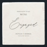 Modern Black & White Calligraphy Engagement Party Steinuntersetzer<br><div class="desc">Mit unserem neuen Untersetzer der modernen Black & White Calligraphy Engagement Party Stone! Feiern Sie Ihre Verlobungsfeier mit diesen eleganten und personalisierten Untersetzer, die in wunderschöner Kalligrafie die Worte "Wir sind Verlobt" enthalten. Der Untersetzer ist schlicht, aber stilvoll mit einer modernen Touch gestaltet und eignet sich perfekt für eine moderne...</div>