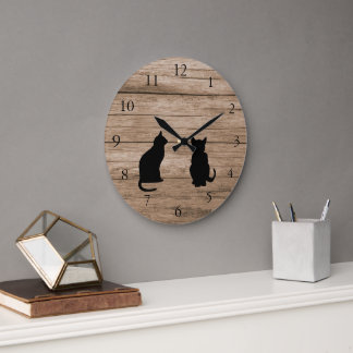 Modern cat silhouettes on rustic dark wood große wanduhr