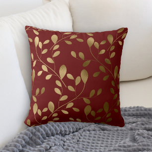 Modern Gold Leaf Muster auf Maroon Red Kissen
