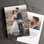 Modern Script Simple Wedding Foto Dankeskarte<br><div class="desc">Ein Modern Script Simple Wedding Foto Dankeschön You Card mit handgeschriebenem Schriftart,  komplettes Portrait Foto auf der Vorderseite mit Namen und Hochzeitsdetails. Der Rücken hat ein zweites Foto mit einer Danksagung von den Neuvermählten. Klicken Sie auf die Schaltfläche Bearbeiten,  um dieses Design anzupassen.</div>