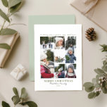 Modern Simple Christmas Family Foto Collage Feiertagskarte<br><div class="desc">Diese moderne Weihnachtskarte aus dem Foto der Familie bietet Platz für sieben Fotos an der Vorderseite,  gepaart mit einem sauberen grünen Rücken für Ihre personalisierte Botschaft und Namen in eleganter Typografie. Ein einfaches,  minimalistisches Design,  das sich ideal eignet,  um in diesem Winter helle Erinnerungen mit Lieben zu teilen.</div>