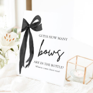 Moderne elegante Black Bow schätzt, wie viele Bows Sockelschild