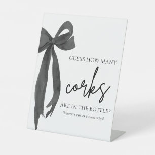 Moderne elegante Black Bow schätzt, wie viele Cork Sockelschild