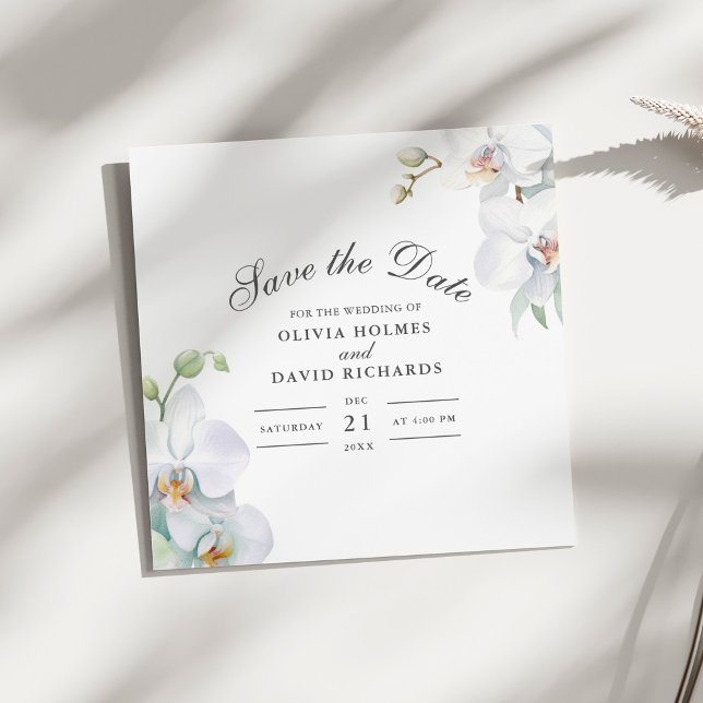 Moderne elegante White Orchid Save the Date Card (Modern Elegant White Orchid Save the Date Card on a sunny white table.)