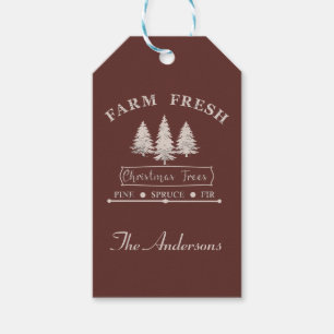 Moderne frische Weihnachts-Tannenbäume auf dem Bau Geschenkanhänger