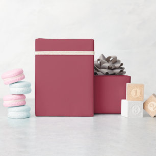 Moderne gedämpfte rote Geschenkpapierrolle Geschenkpapier